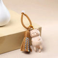 Hand Carved Natural Wood Cat Keychain with Colorful Tassel Cute Sleeping Kitten Braided Rope Charm Car Hanging Pendant Ornament
